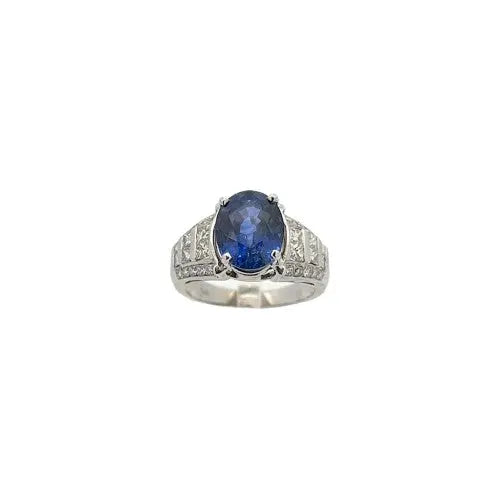 5.08ct Oval Sapphire Ring with 1.00ctw Round Brilliant and Princess Cut Diamonds