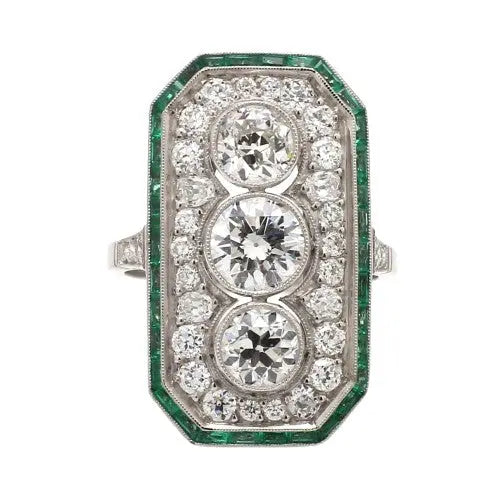 Platinum Ring with Diamonds and Emerald Accents