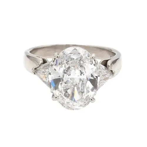 Platinum Ring with Oval & Trillion Cut Diamonds