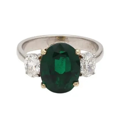 Platinum Ring with Oval Emerald and Diamond Accents