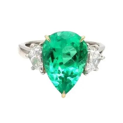 Platinum and 18K Yellow Gold Ring with Emerald and Diamonds