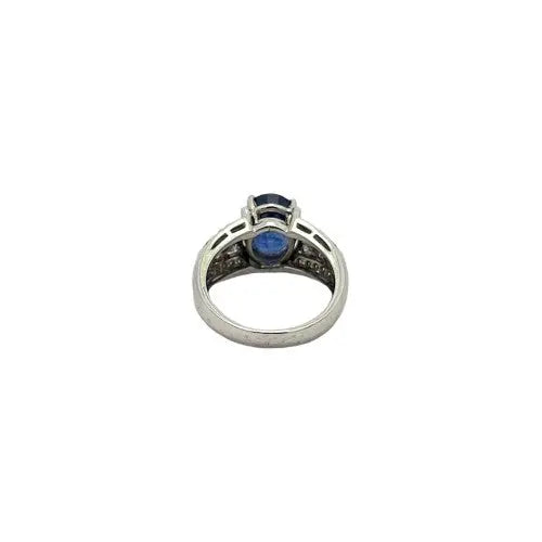 5.08ct Oval Sapphire Ring with 1.00ctw Round Brilliant and Princess Cut Diamonds