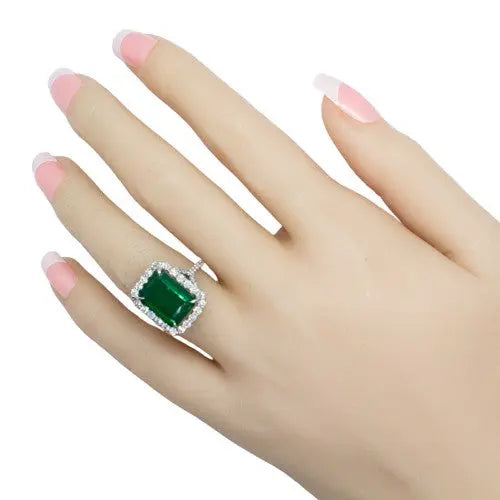 Platinum Ring with Emerald Cut Emerald and Diamond Accents