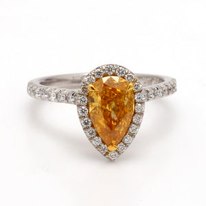 Fancy Orangy Yellow Diamond Ring with Round Diamond Accents