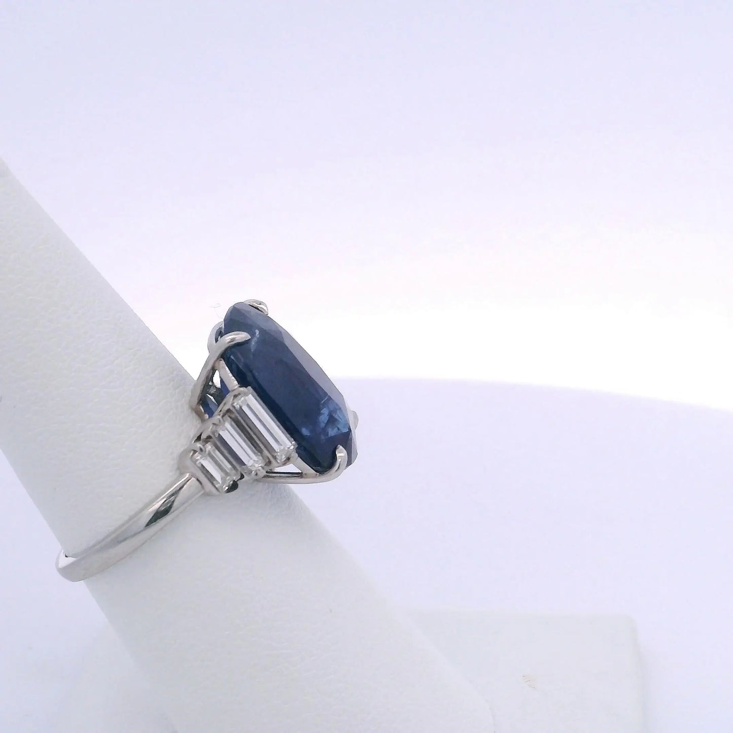 12.92CTW CUSHION SAPPHIRE & 0.66 BAGUETTE CUT DIAMOND RING