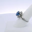 4.37CTW OVAL BLUE SAPPHIRE & 1.00CTW ROUND BRILLIANT CUT DIAMOND RING