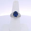 5.08CTW OVAL CUT SAPPHIRE 1.00CTW PRINCESS & ROUND BRILLIANT CUT DIAMOND RING