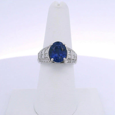 5.08CTW OVAL CUT SAPPHIRE 1.00CTW PRINCESS & ROUND BRILLIANT CUT DIAMOND RING