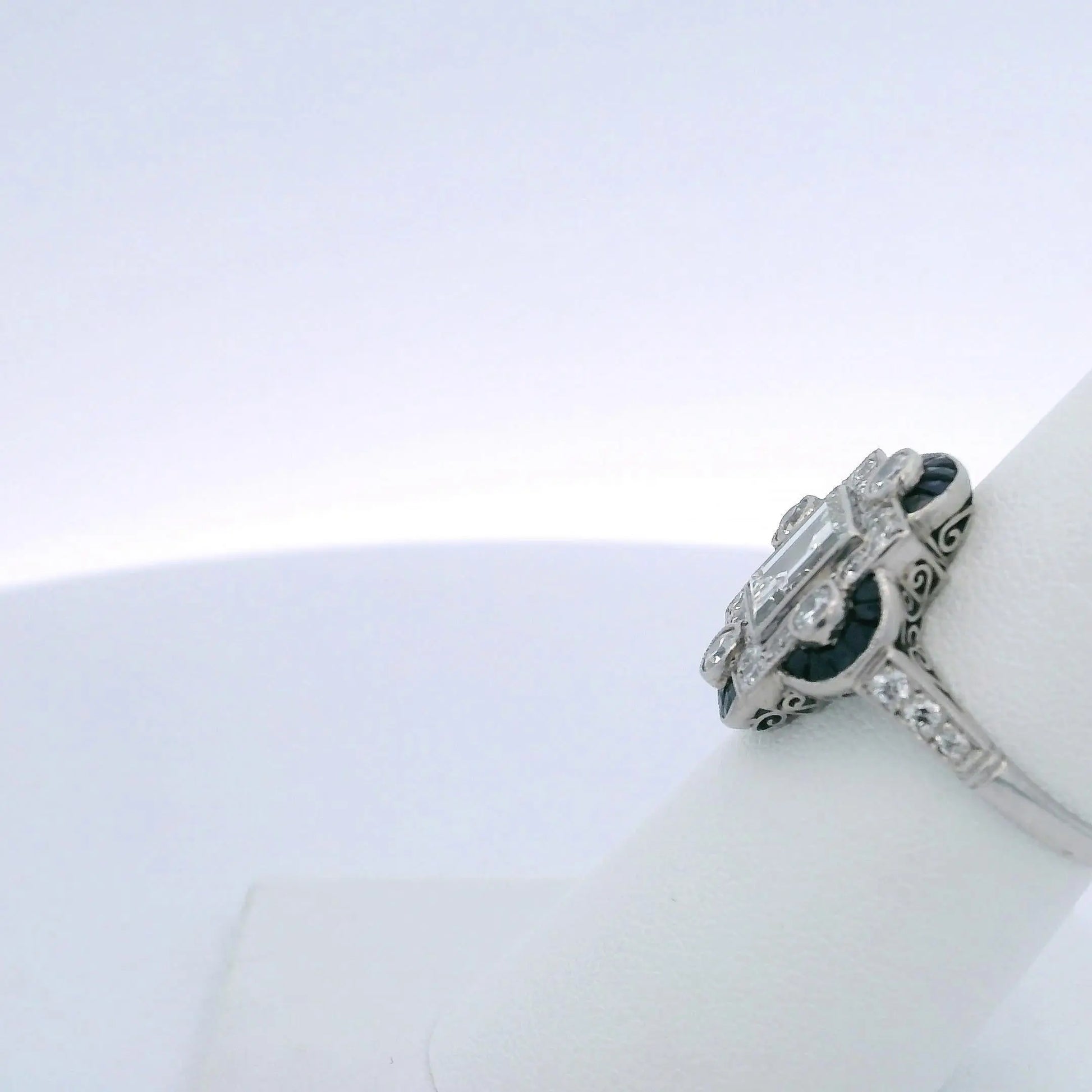 1.30CTW STEP CUT DIAMOND & 0.60CTW SAPPHIRE RING