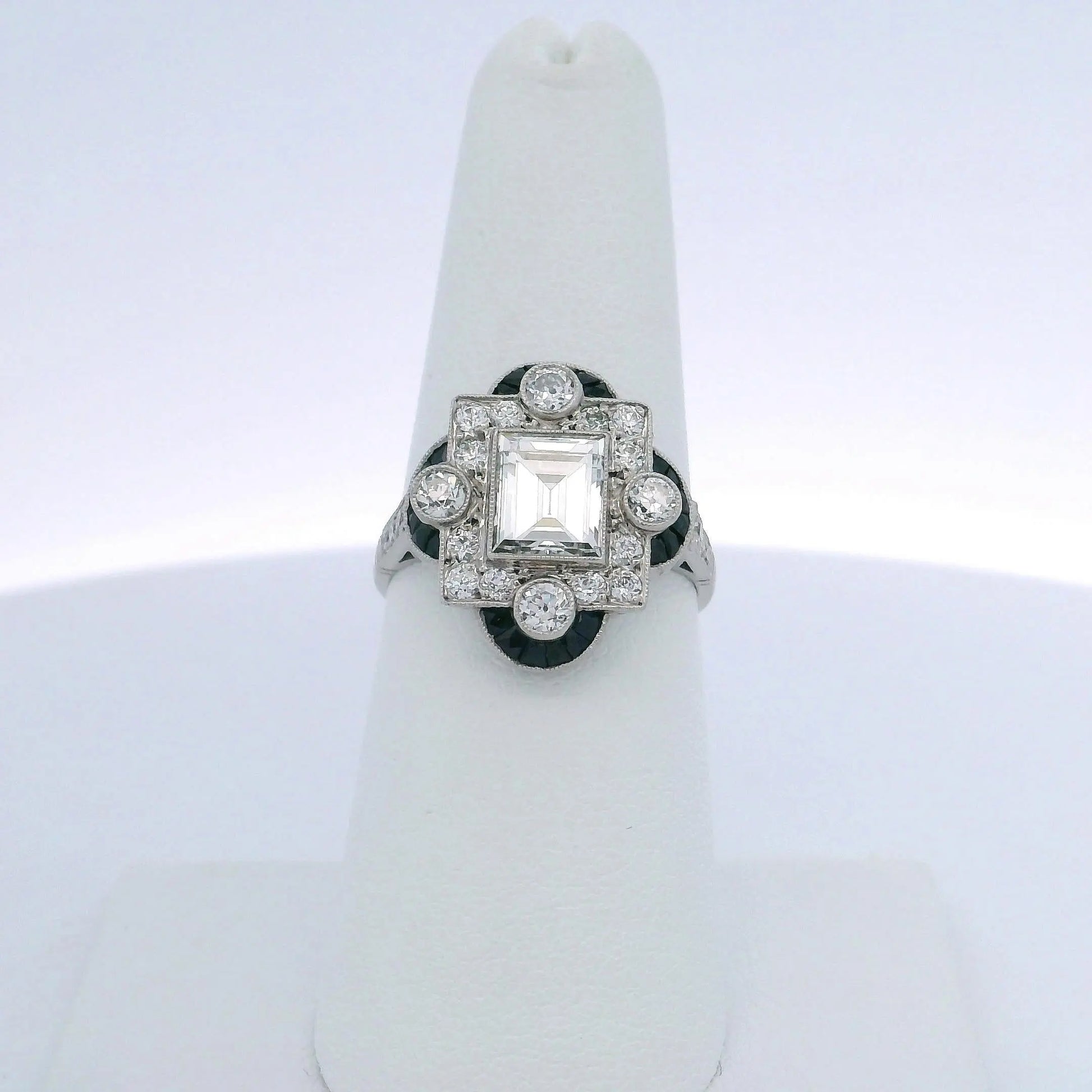 1.30CTW STEP CUT DIAMOND & 0.60CTW SAPPHIRE RING