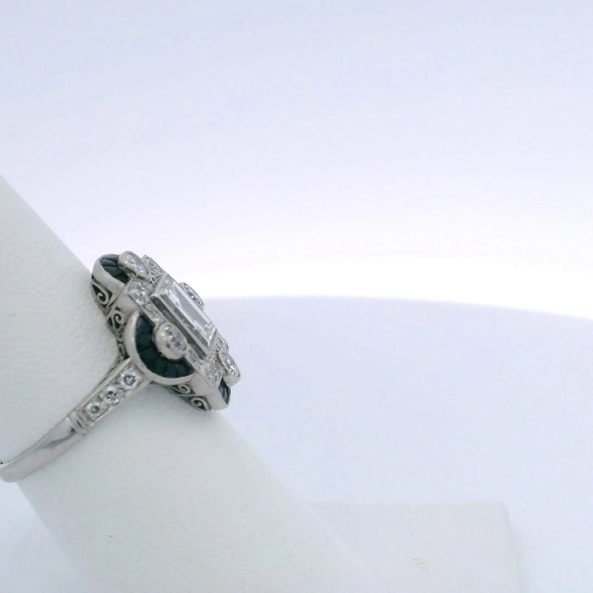 1.30CTW STEP CUT DIAMOND & 0.60CTW SAPPHIRE RING