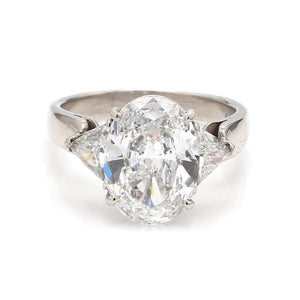 Platinum Ring with Oval & Trillion Cut Diamonds