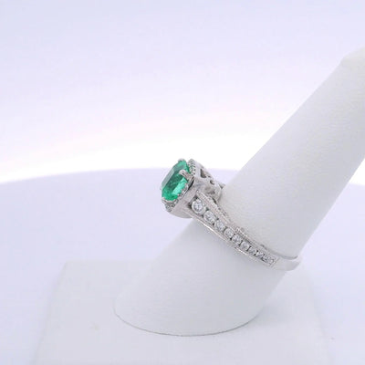 1.83 OCTAGONAL CUT COLOMBIAN EMERALD & 0.67CTW ROUND BRILLIANT CUT DIAMOND RING