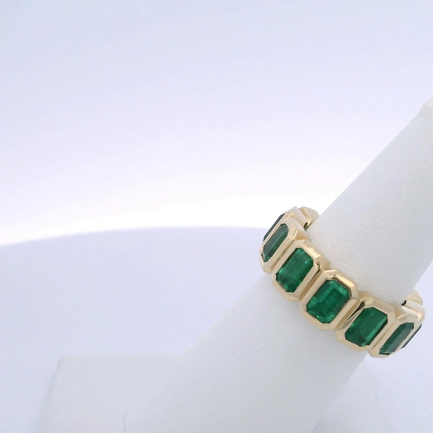 6.45CTW EMERALD CUT EMERALD ETERNITY BAND