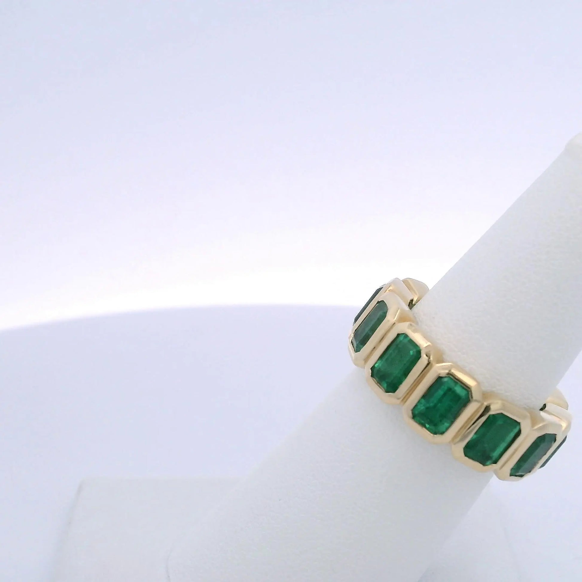 6.45CTW EMERALD CUT EMERALD ETERNITY BAND