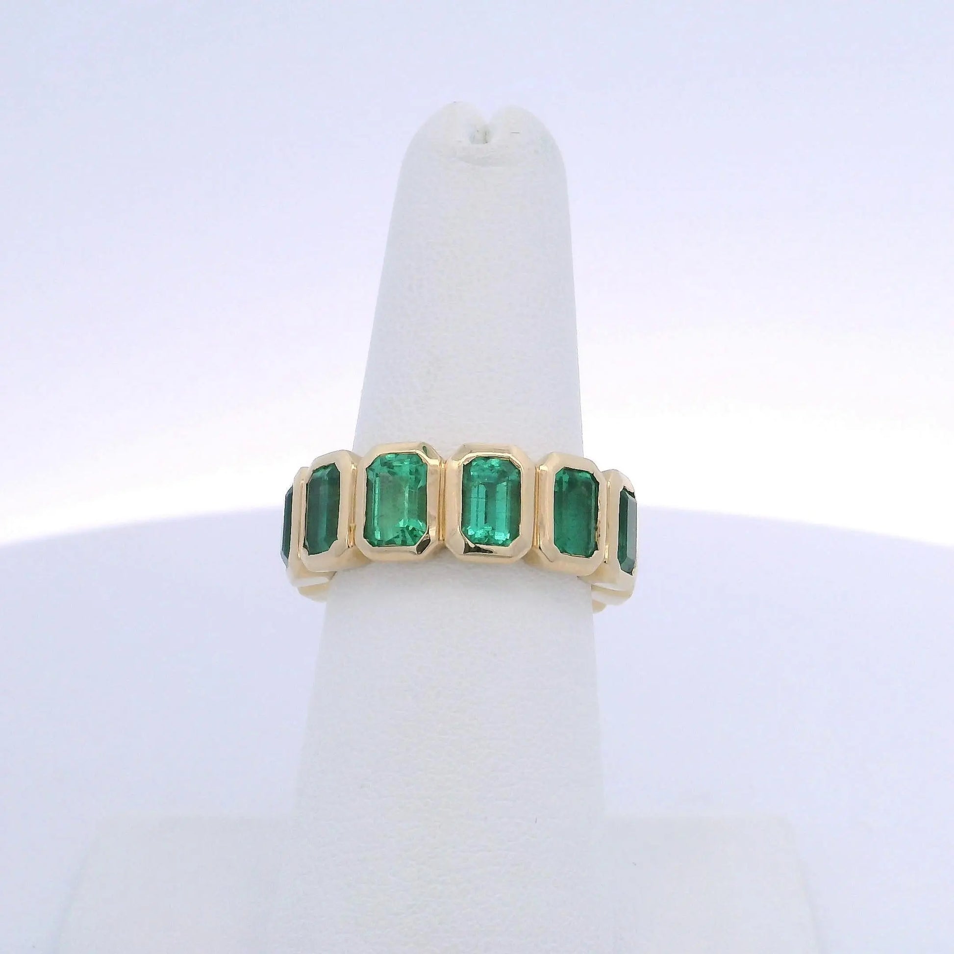6.45CTW EMERALD CUT EMERALD ETERNITY BAND