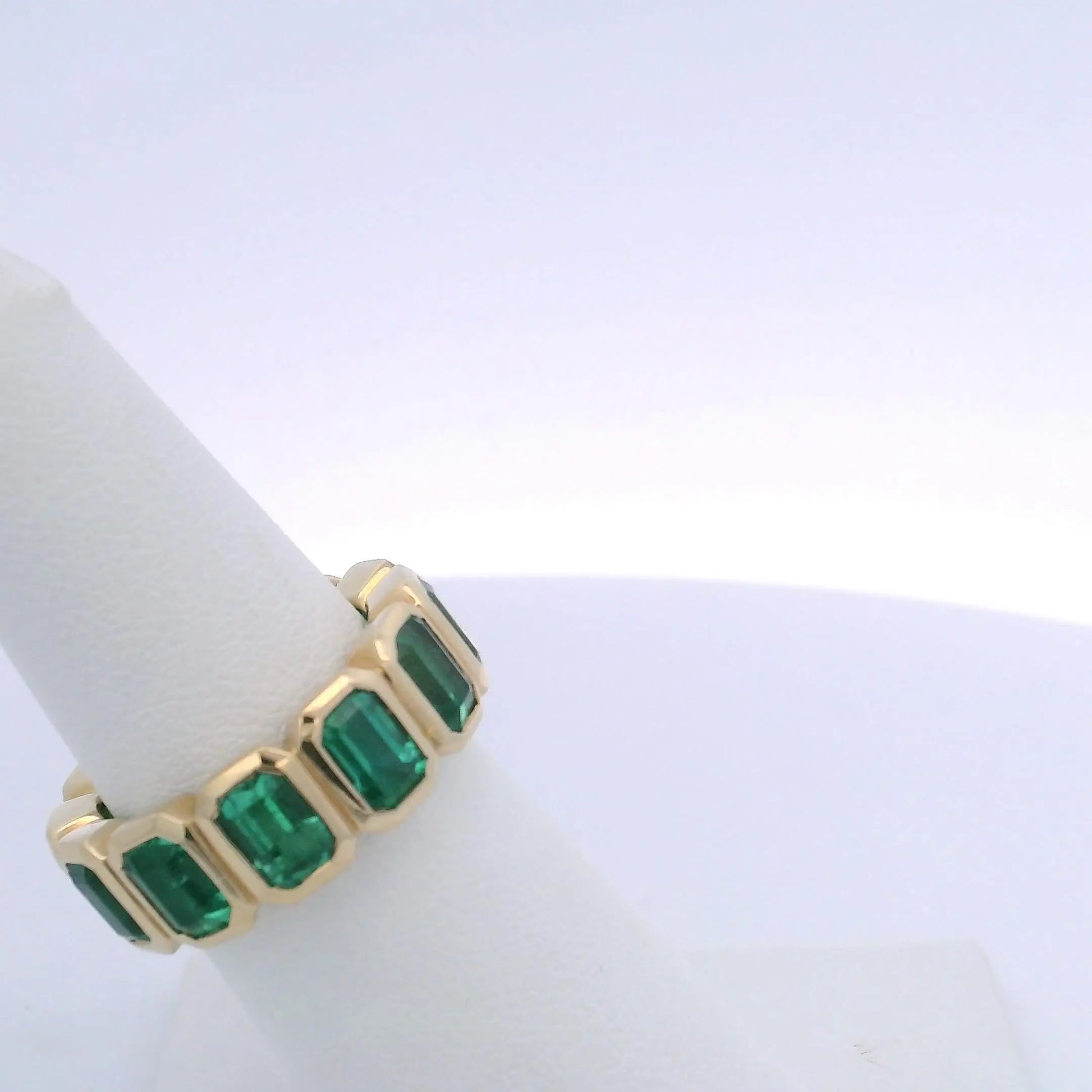 6.45CTW EMERALD CUT EMERALD ETERNITY BAND