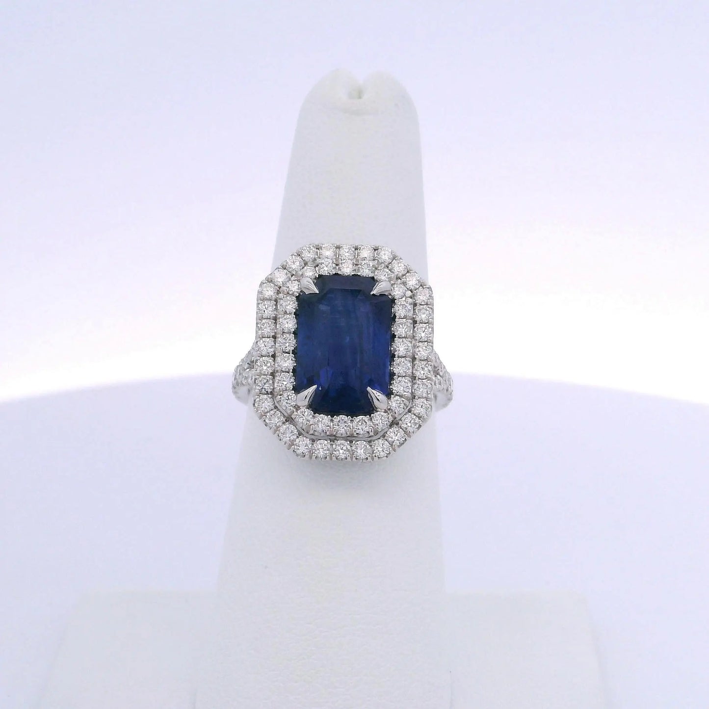 5.28CTW EMERALD CUT SAPPHIRE & 1.12CTW DIAMOND RING
