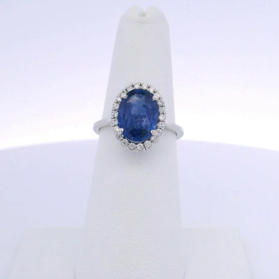 3.31 OVAL SAPPHIRE & 0.25 ROUND BRILLIANT CUT DIAMOND RING
