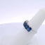 4.25CTW EMERALD CUT SAPPHIRE 7 STONE RING