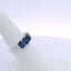 4.25CTW EMERALD CUT SAPPHIRE 7 STONE RING