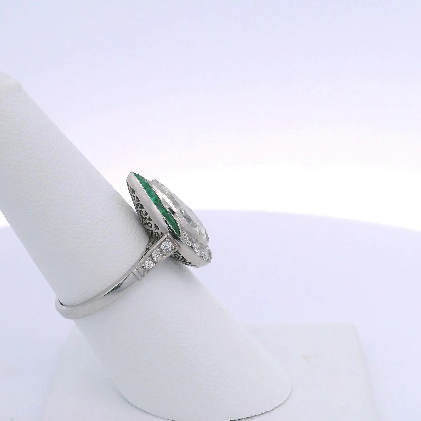 2.80CT ANTIQUE PEAR SHAPED DIAMOND & 1.40CTW EMERALD RING