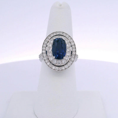 6.63CTW OVAL SAPPHIRE & 0.94CTW ROUND BRILLIANT CUT DIAMOND RING
