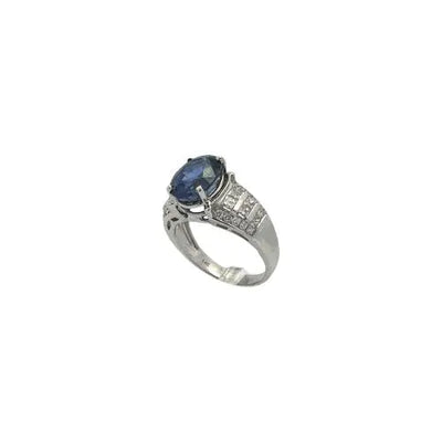 5.08ct Oval Sapphire Ring with 1.00ctw Round Brilliant and Princess Cut Diamonds