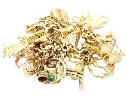 14k Yellow Gold Bracelet with Emeralds, Diamonds, and 25 Charms