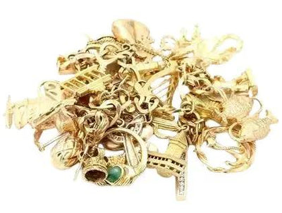 14k Yellow Gold Bracelet with Emeralds, Diamonds, and 25 Charms