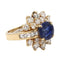 Blue Sapphire Ring with Round and Baguette Diamond Accents