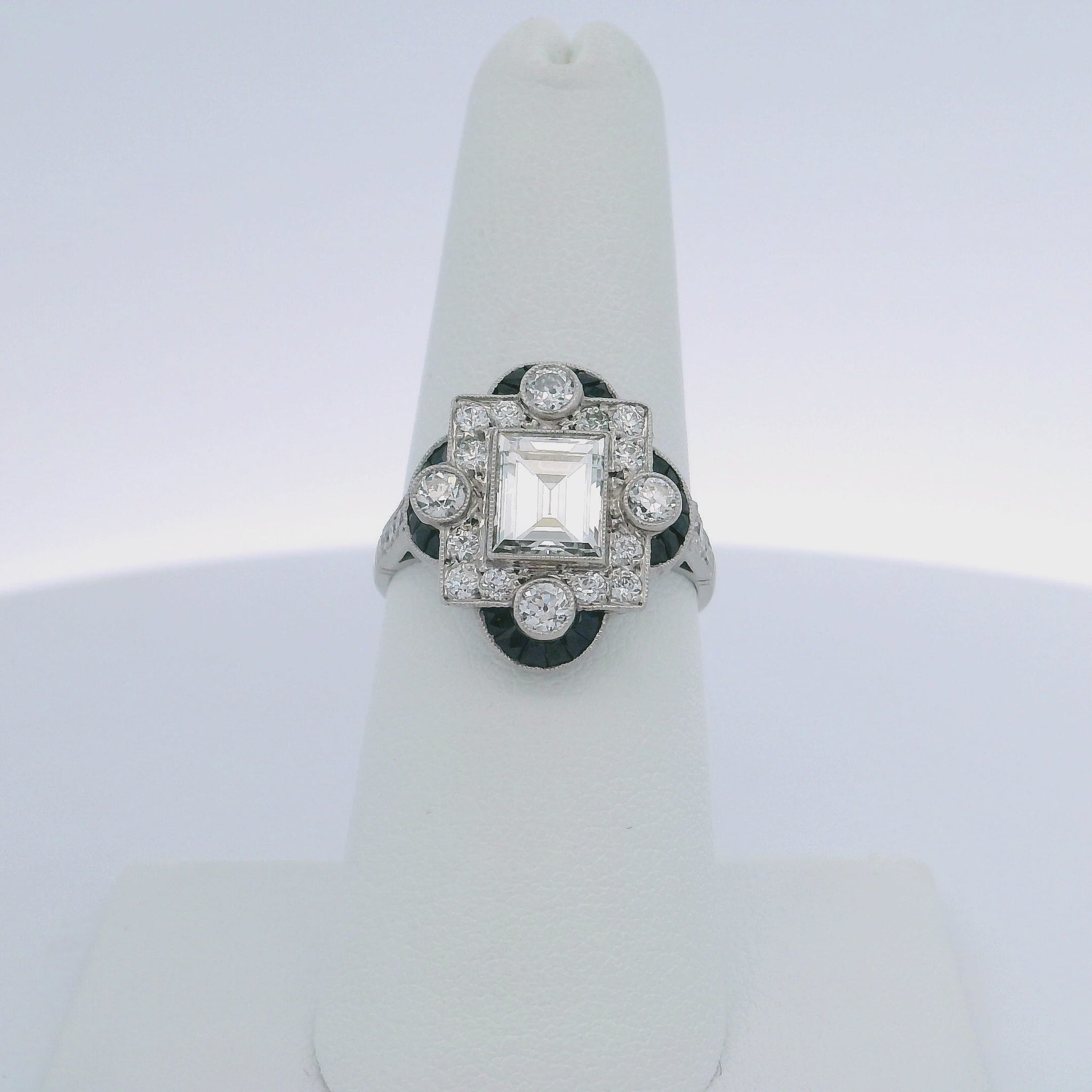 1.30CTW STEP CUT DIAMOND & 0.60CTW SAPPHIRE RING