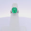 4.85CTW EMERALD CUT COLOMBIAN EMERALD & 1.00CTW TRILLION CUT DIAMOND RING