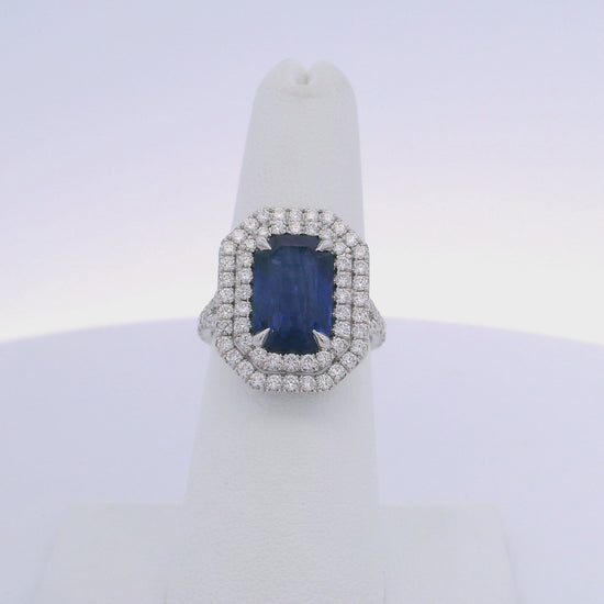 5.28CTW EMERALD CUT SAPPHIRE & 1.12CTW DIAMOND RING