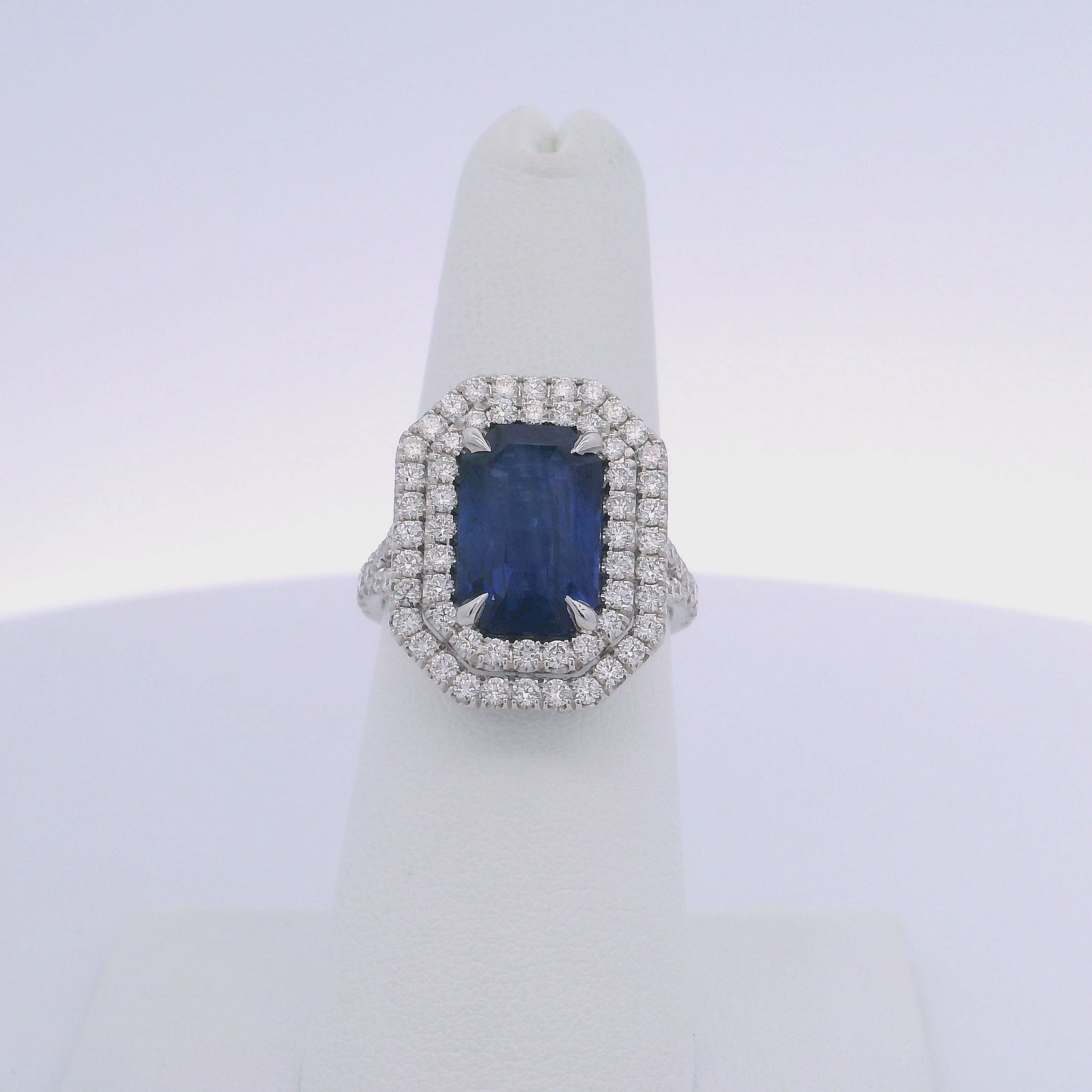 5.28CTW EMERALD CUT SAPPHIRE & 1.12CTW DIAMOND RING