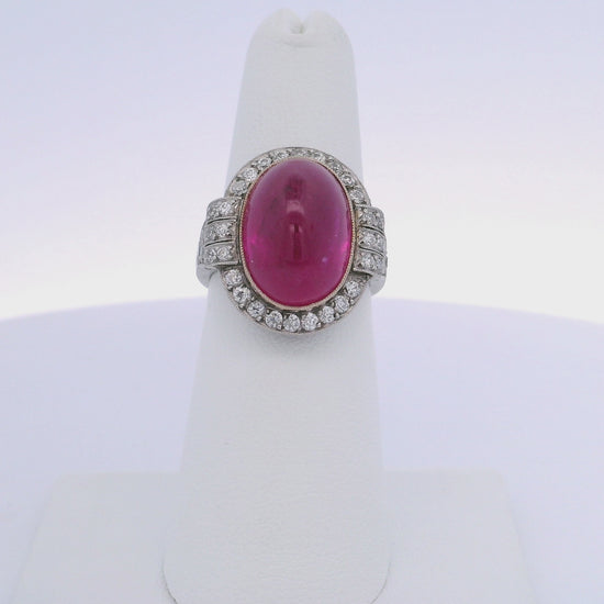 15.25CT OVAL RUBY & 0.75CTW ROUND BRILLIANT CUT DIAMOND RING