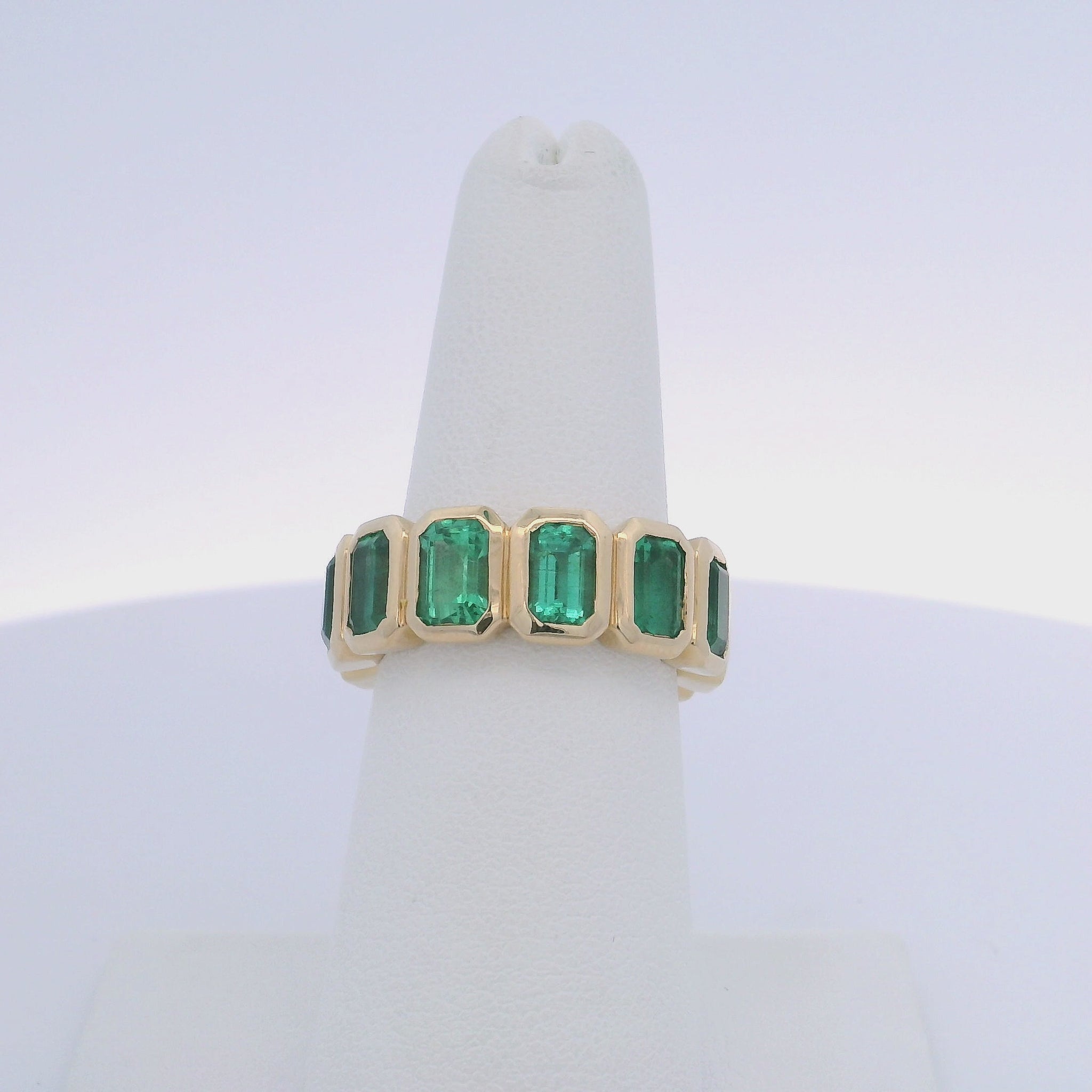 6.45CTW EMERALD CUT EMERALD ETERNITY BAND