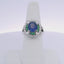 3.91CTW OVAL SAPPHIRE 1.00CTW BAGUETTE & BRILLIANT CUT DIAMOND