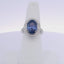 8.07CTW OVAL SAPPHIRE & 0.50CTW ROUND BRILLIANT CUT DIAMOND RING