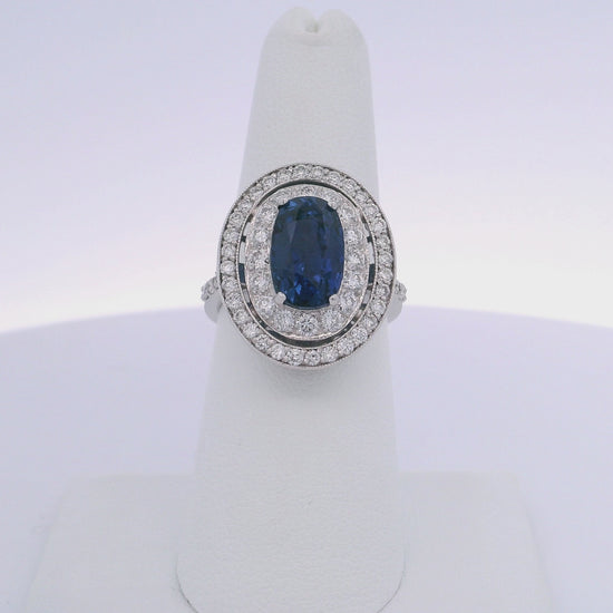 6.63CTW OVAL SAPPHIRE & 0.94CTW ROUND BRILLIANT CUT DIAMOND RING