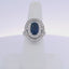 6.63CTW OVAL SAPPHIRE & 0.94CTW ROUND BRILLIANT CUT DIAMOND RING