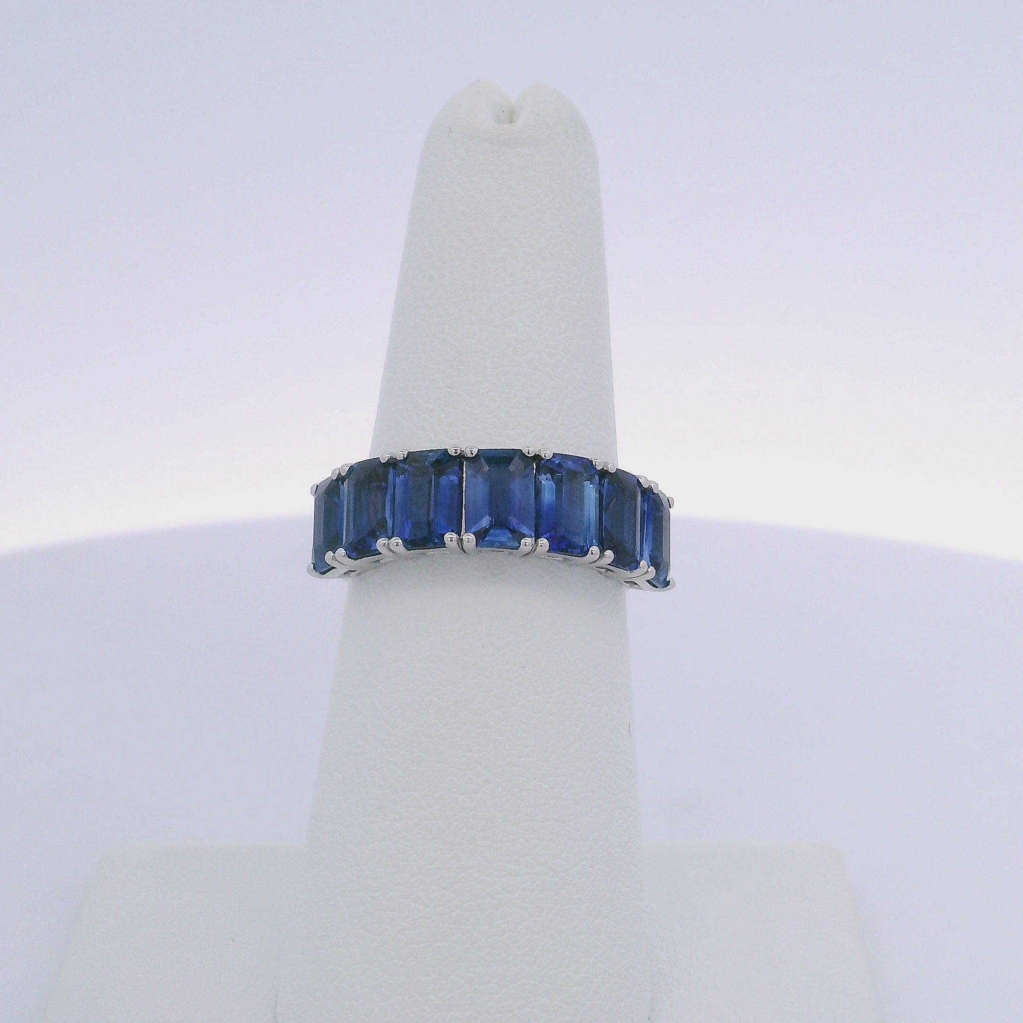 4.25CTW EMERALD CUT SAPPHIRE 7 STONE RING