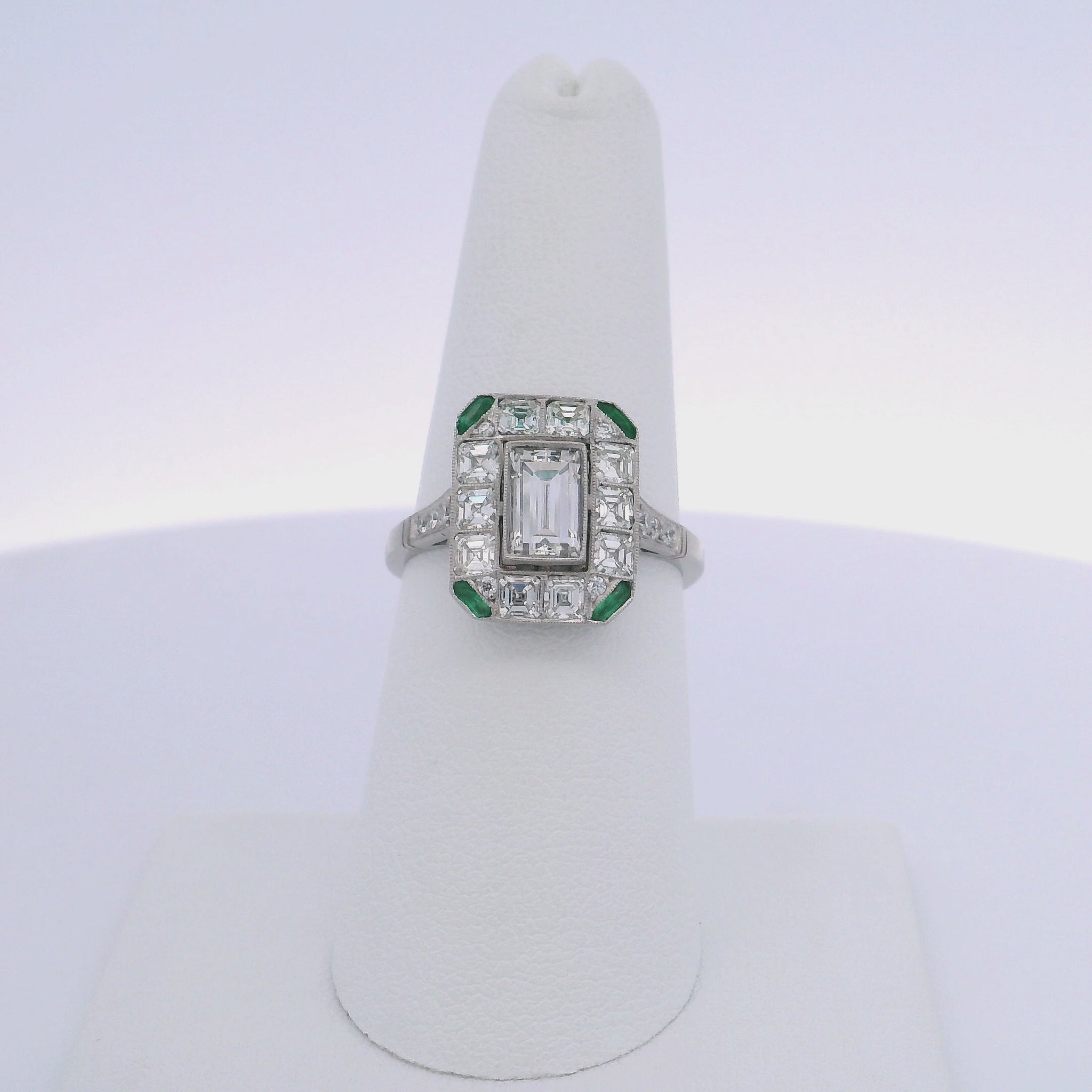0.95CTW BAGUETTE CUT DIAMOND & 0.88CTW EMERALD CUT RING