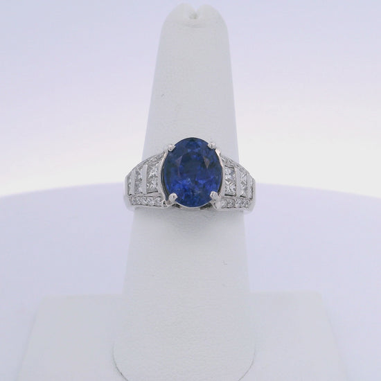 5.08CTW OVAL CUT SAPPHIRE 1.00CTW PRINCESS & ROUND BRILLIANT CUT DIAMOND RING