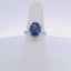 3.31 OVAL SAPPHIRE & 0.25 ROUND BRILLIANT CUT DIAMOND RING