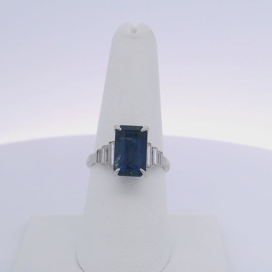6.06CTW EMERALD CUT SAPPHIRE & 0.35CTW BAGUETTE CUT DIAMOND RING