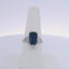 6.06CTW EMERALD CUT SAPPHIRE & 0.35CTW BAGUETTE CUT DIAMOND RING