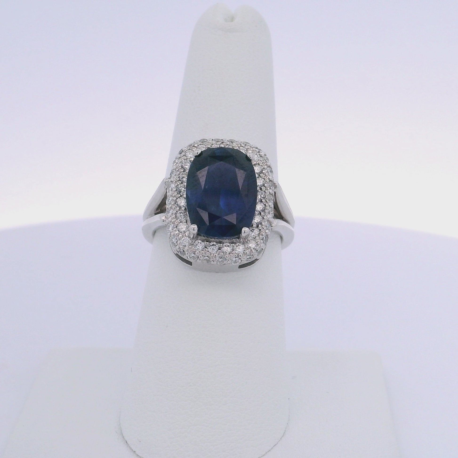 6.00CTW OVAL SAPPHIRE & 0.75CTW ROUND BRILLIANT CUT DIAMOND RING