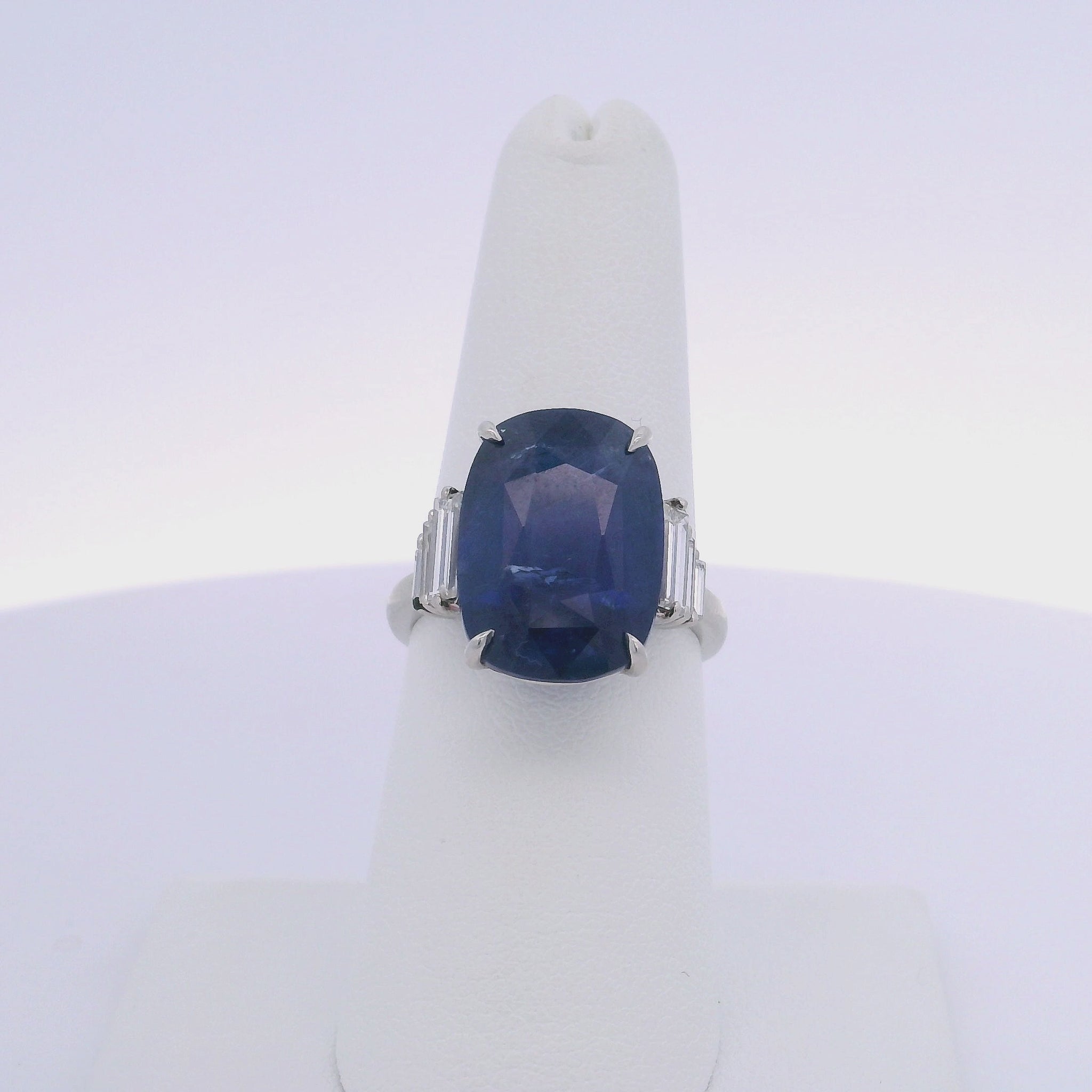 12.92CTW CUSHION SAPPHIRE & 0.66 BAGUETTE CUT DIAMOND RING