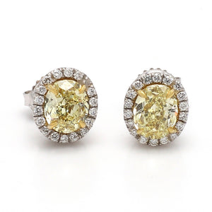2.55ctw Fancy Yellow, Oval Cut Diamond Earrings - GIA Certified